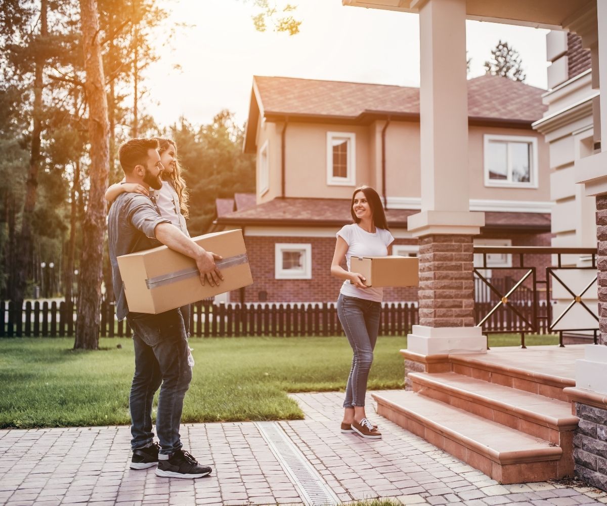 Family moving into new home Family moving into new home