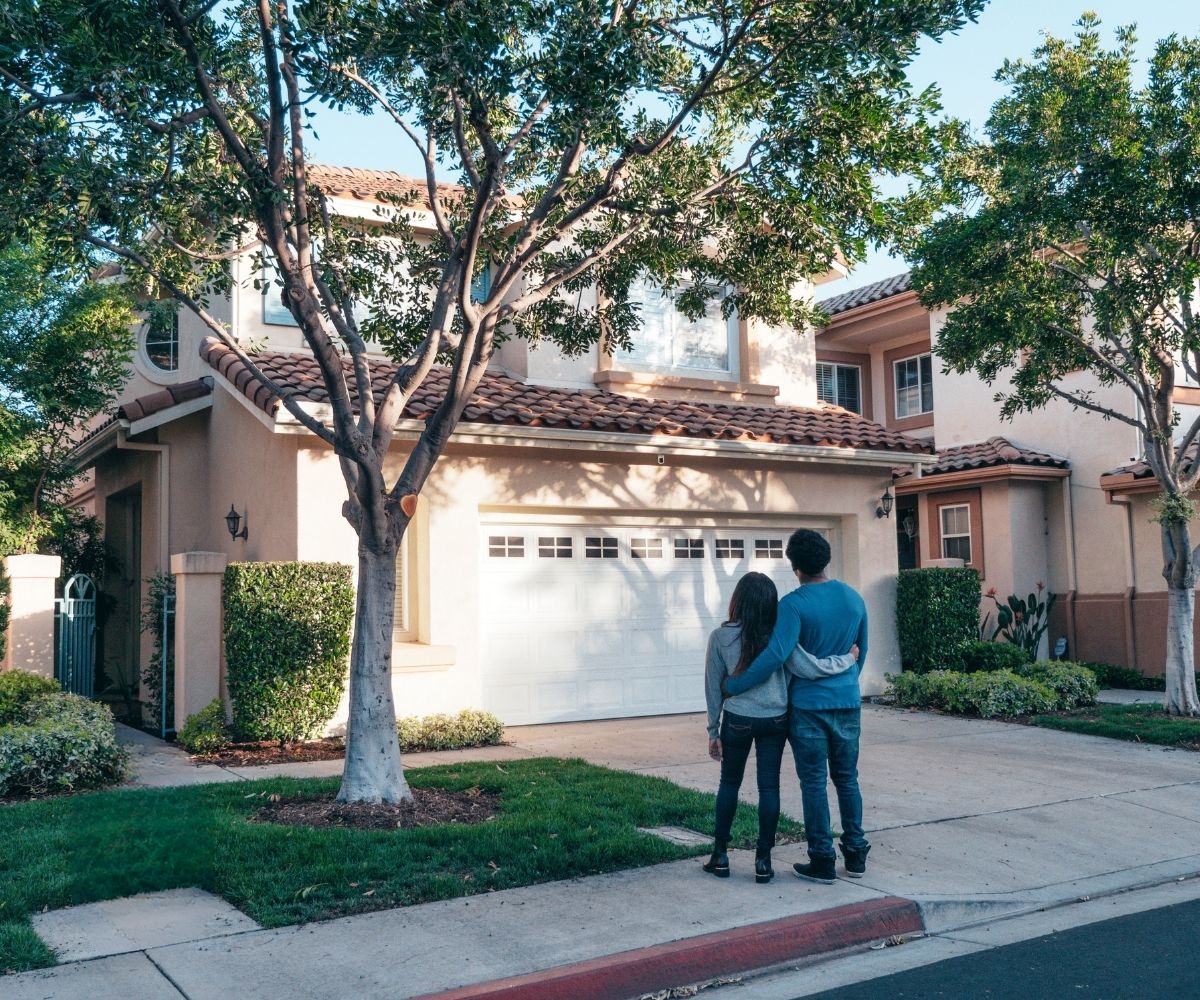 Couple looking at house