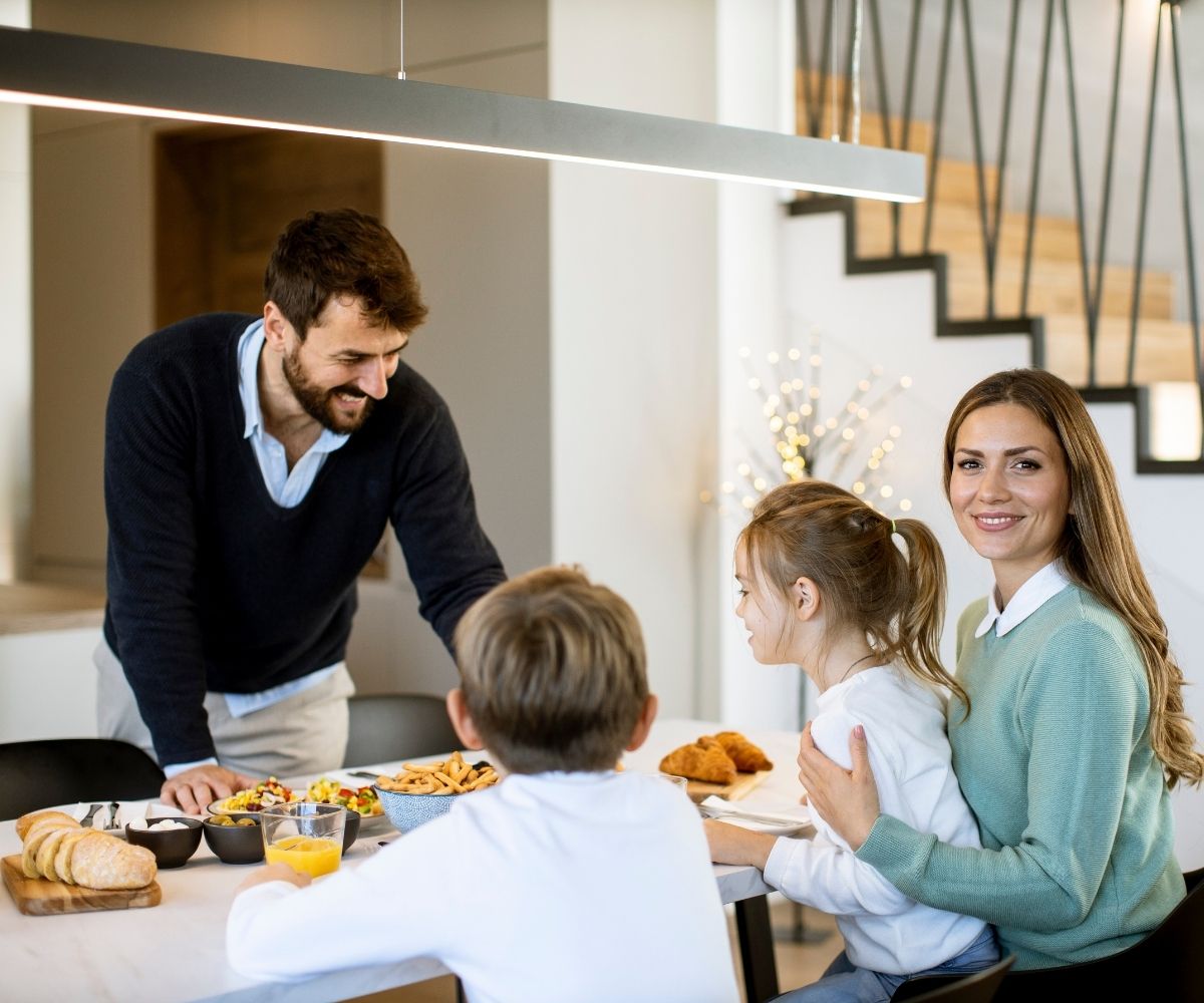 Family eating breakfast at table