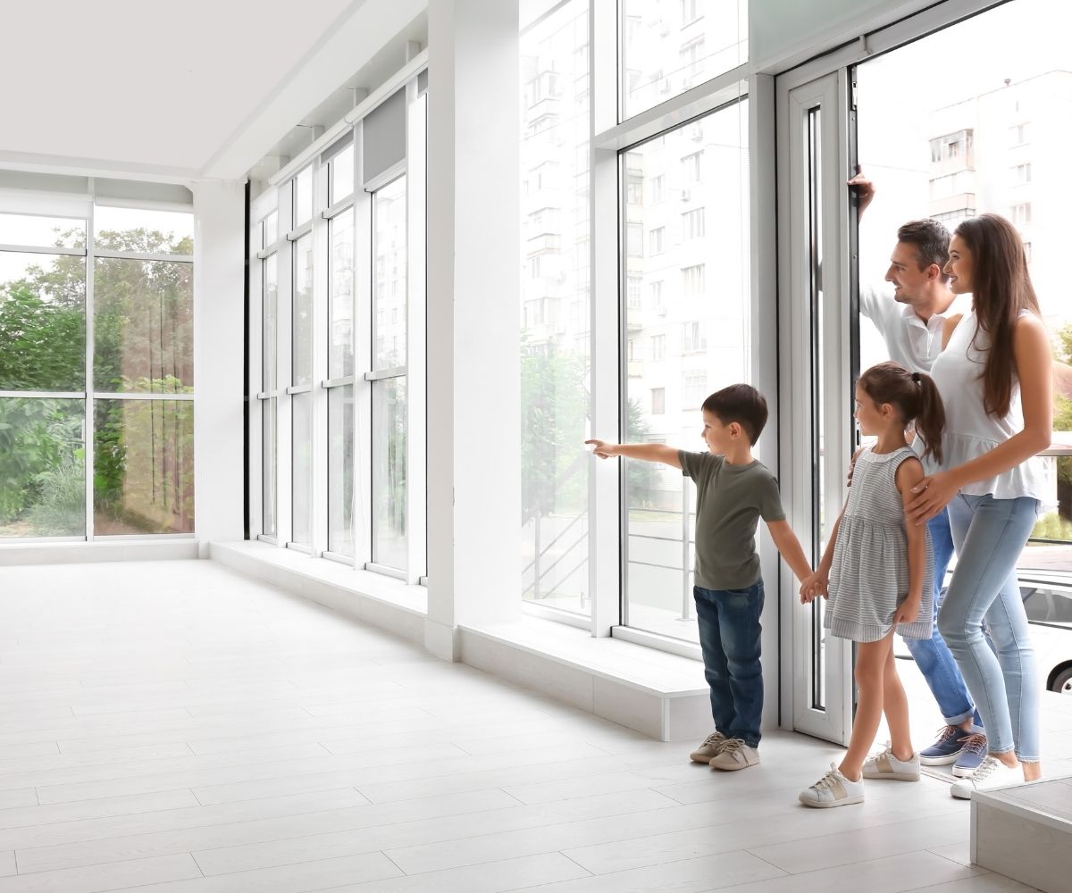 Family walking into empty home
