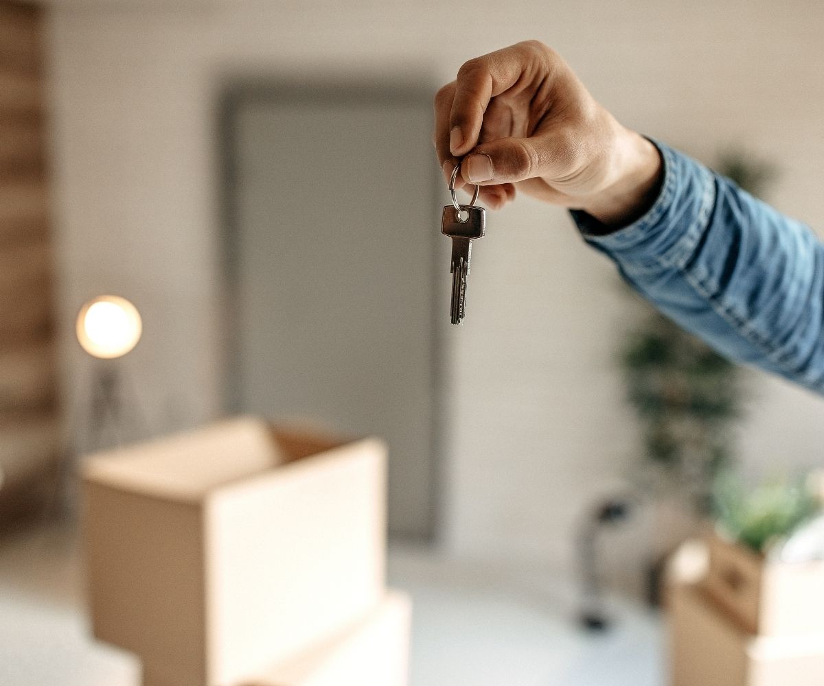 Hand holding key