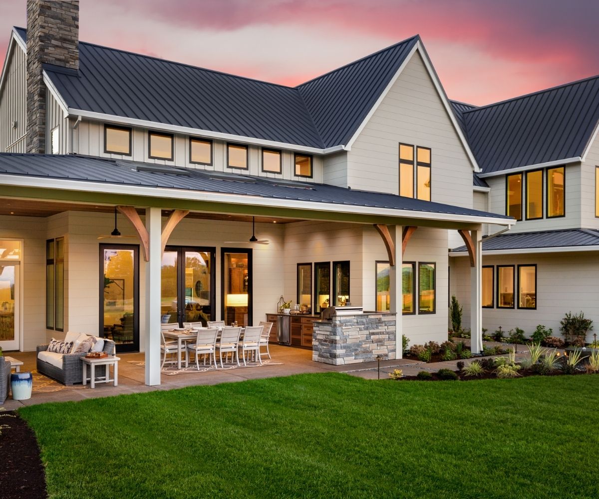 Large home backyard with outdoor kitchen