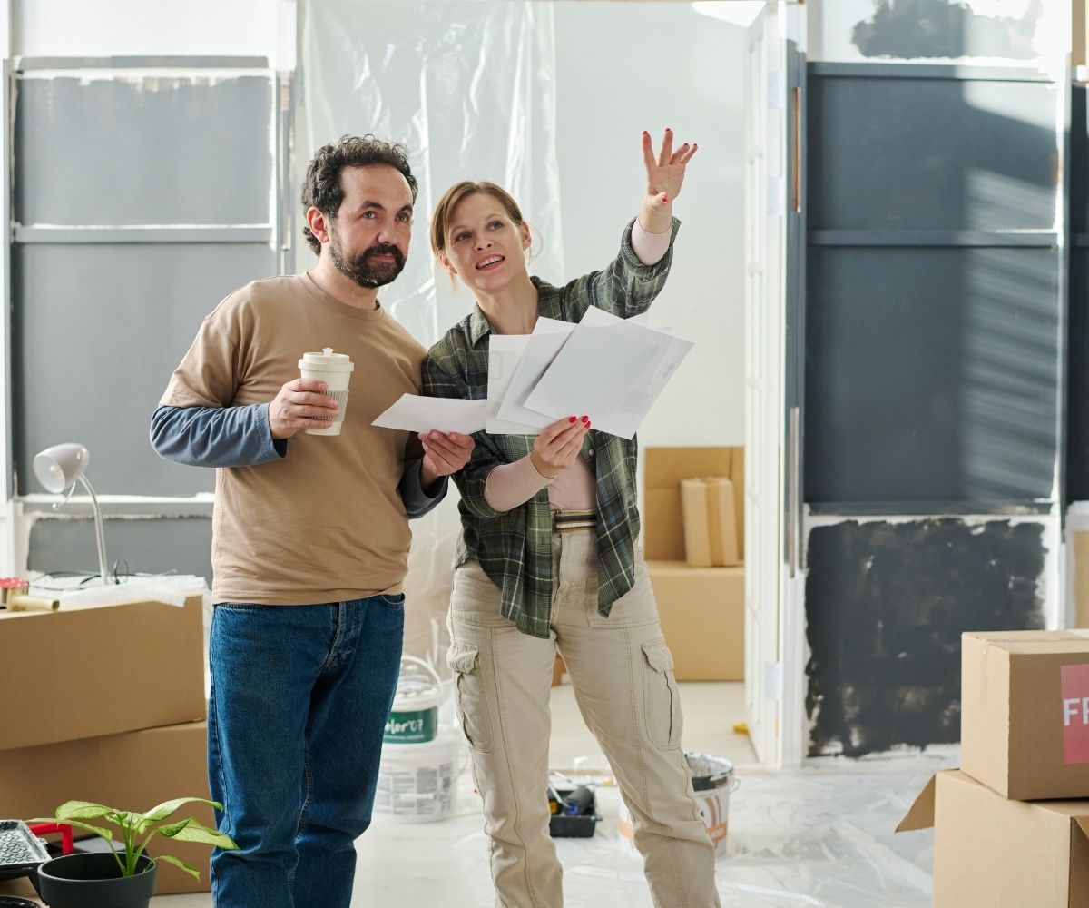 Man and woman planning renovations