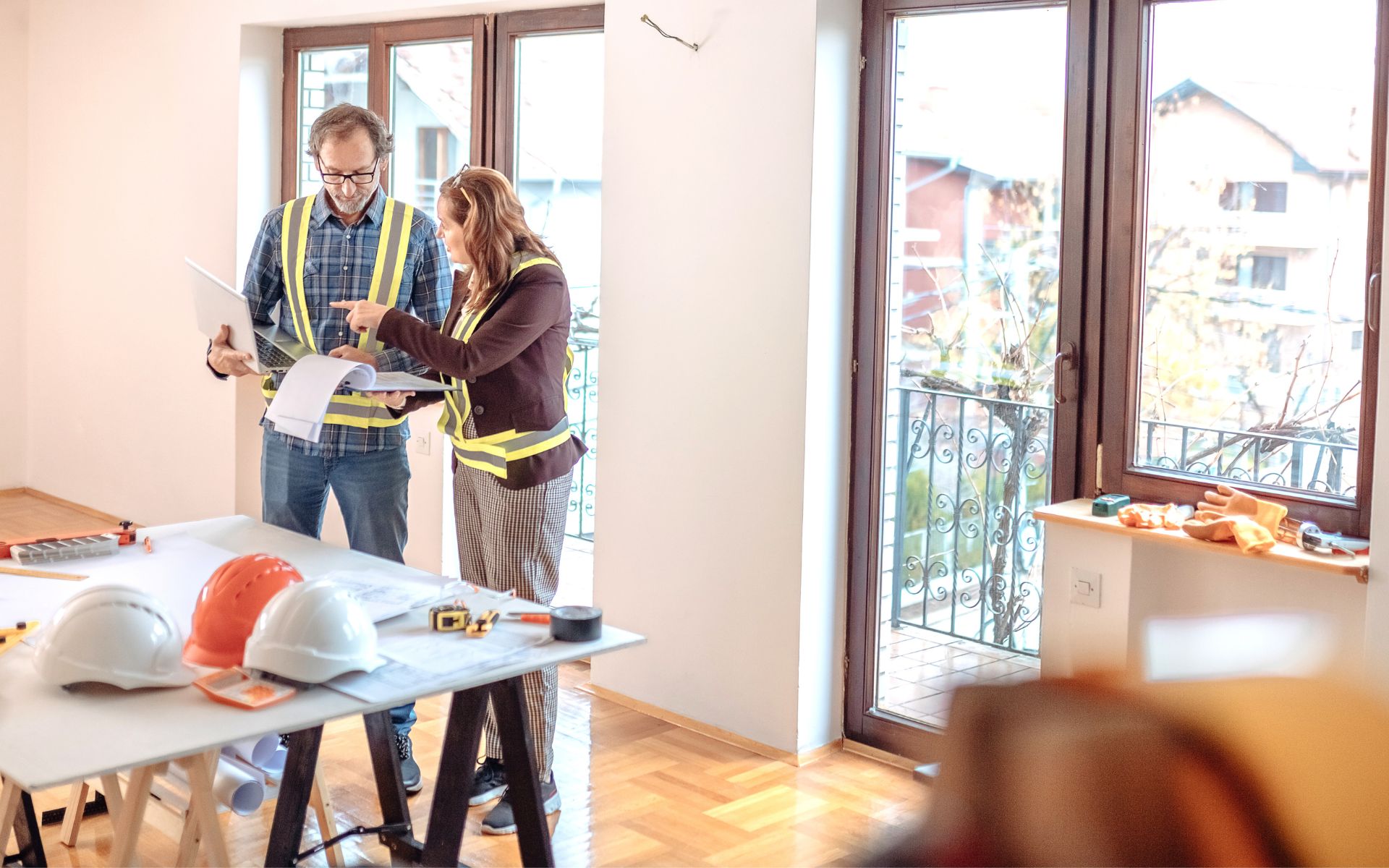 Man and woman discussing renovations